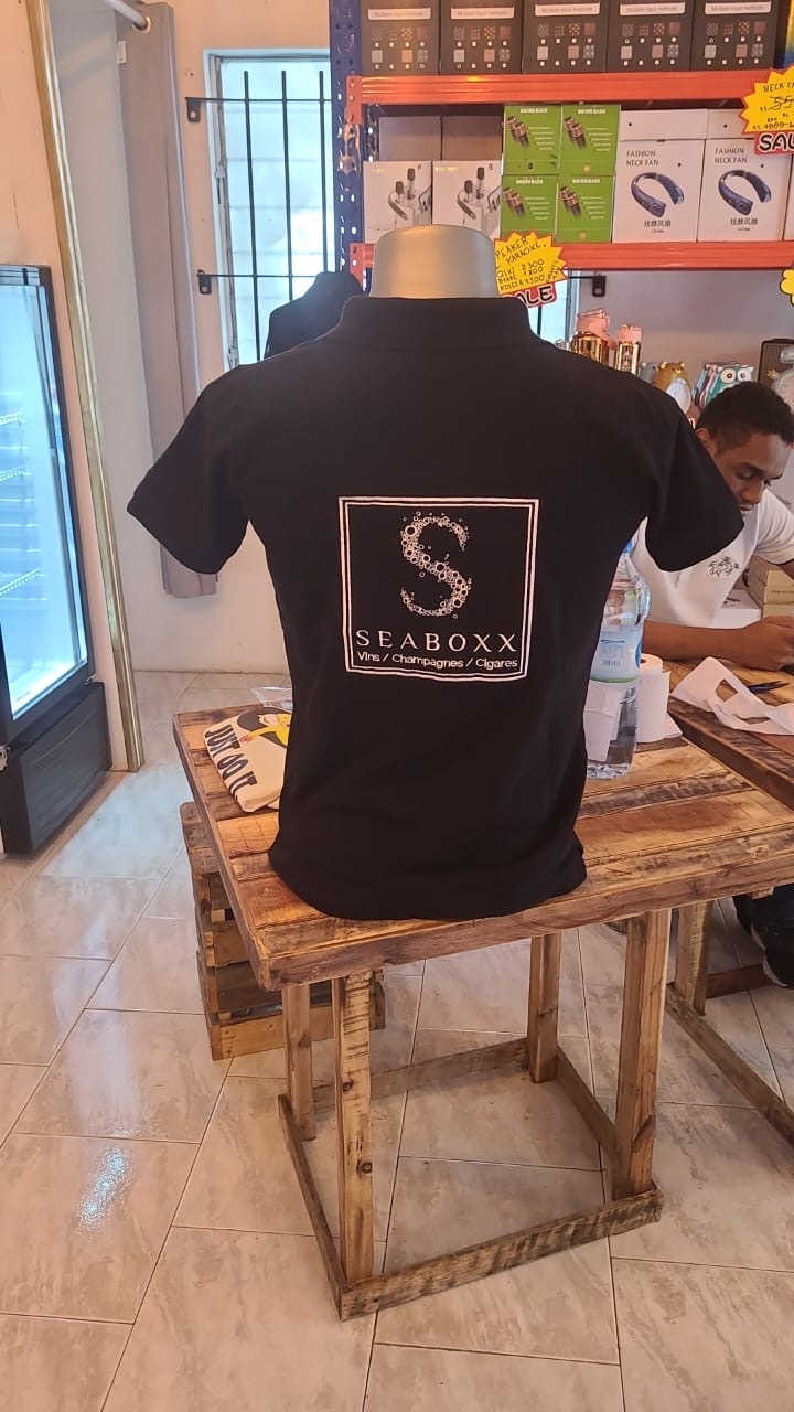 Custom embroidered SEABOXX polo shirt on mannequin